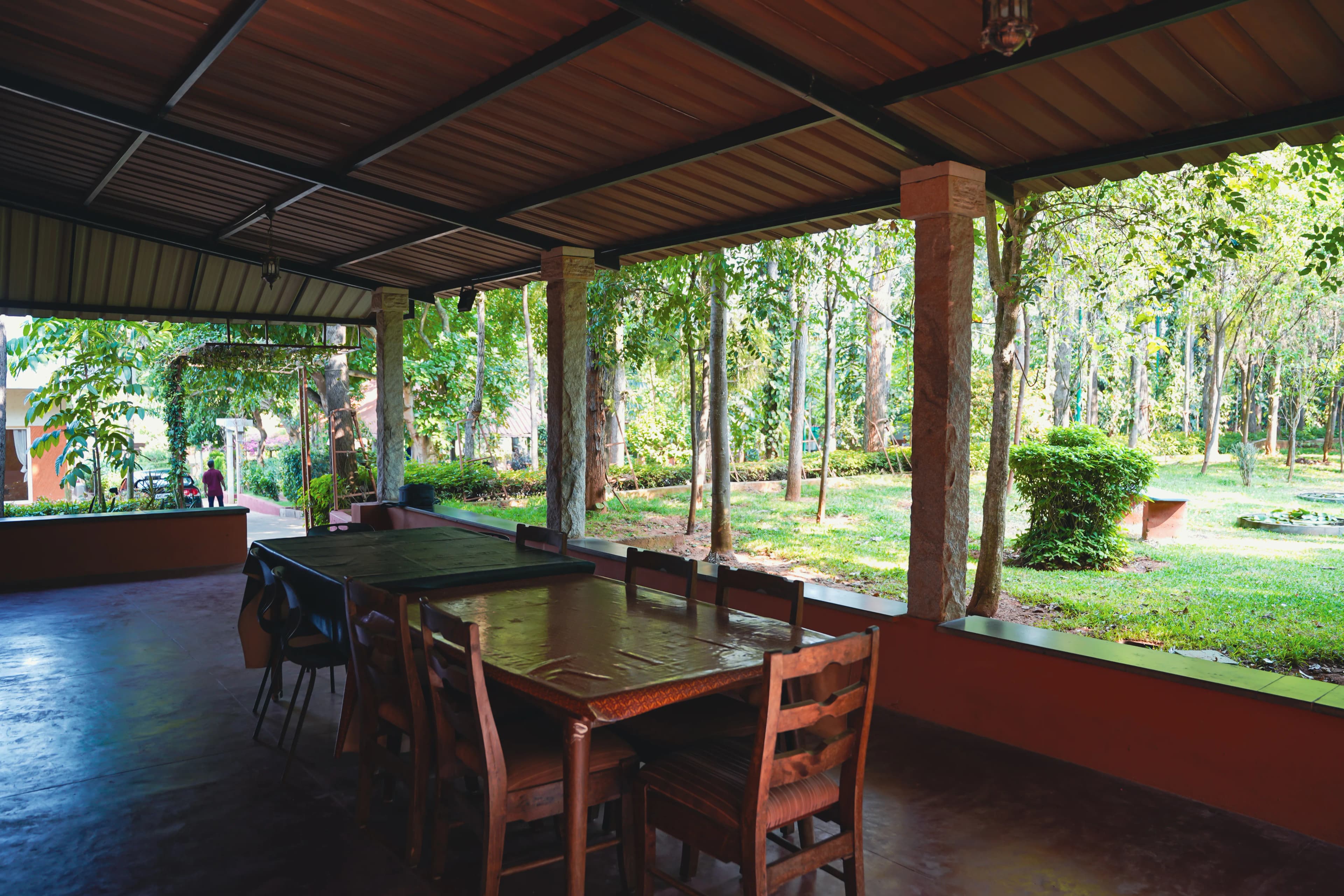 Semi-open dining hall overlooking the gardens