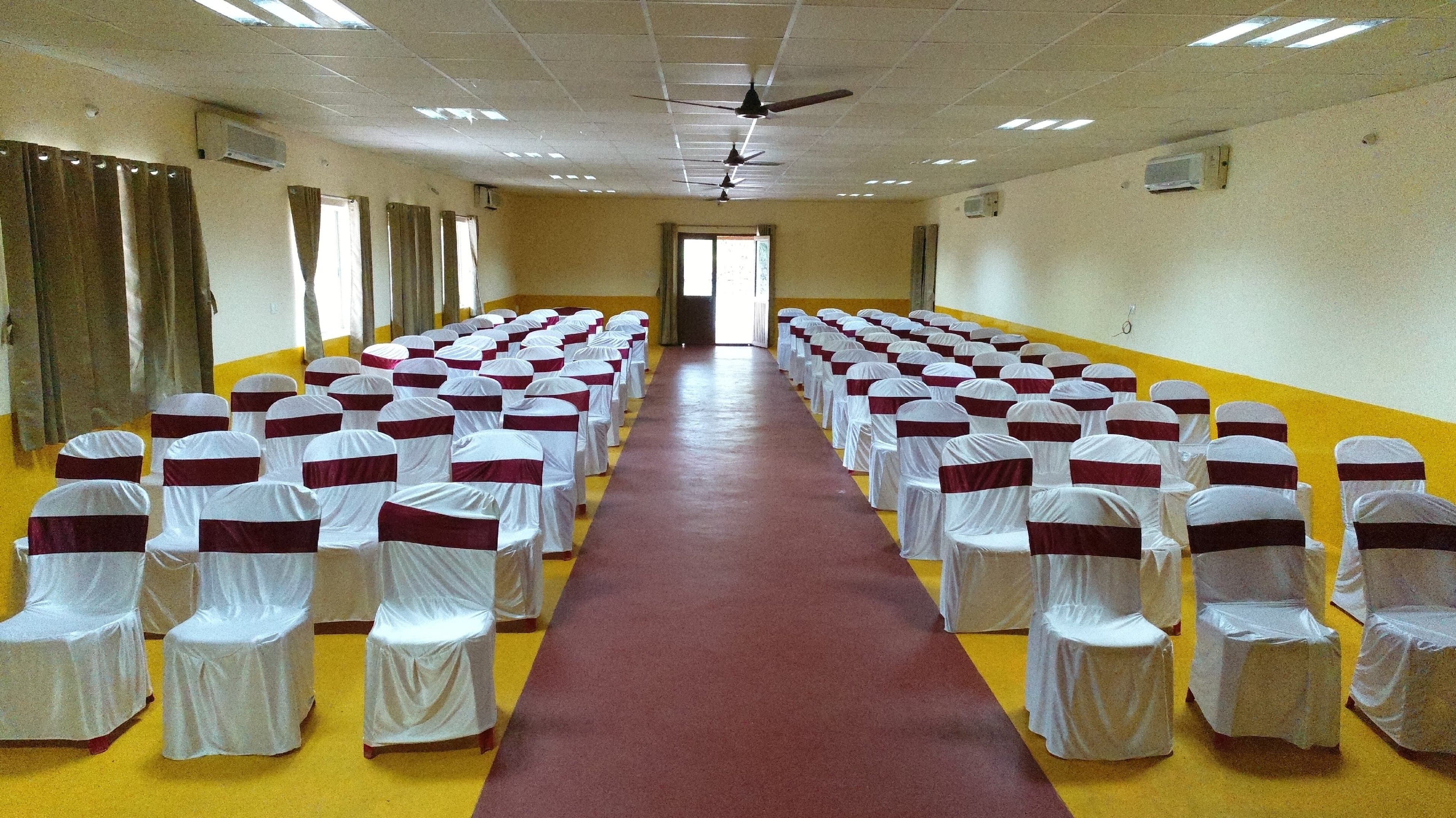 Banquet hall setup at Sharmada Hidden Nest Resort